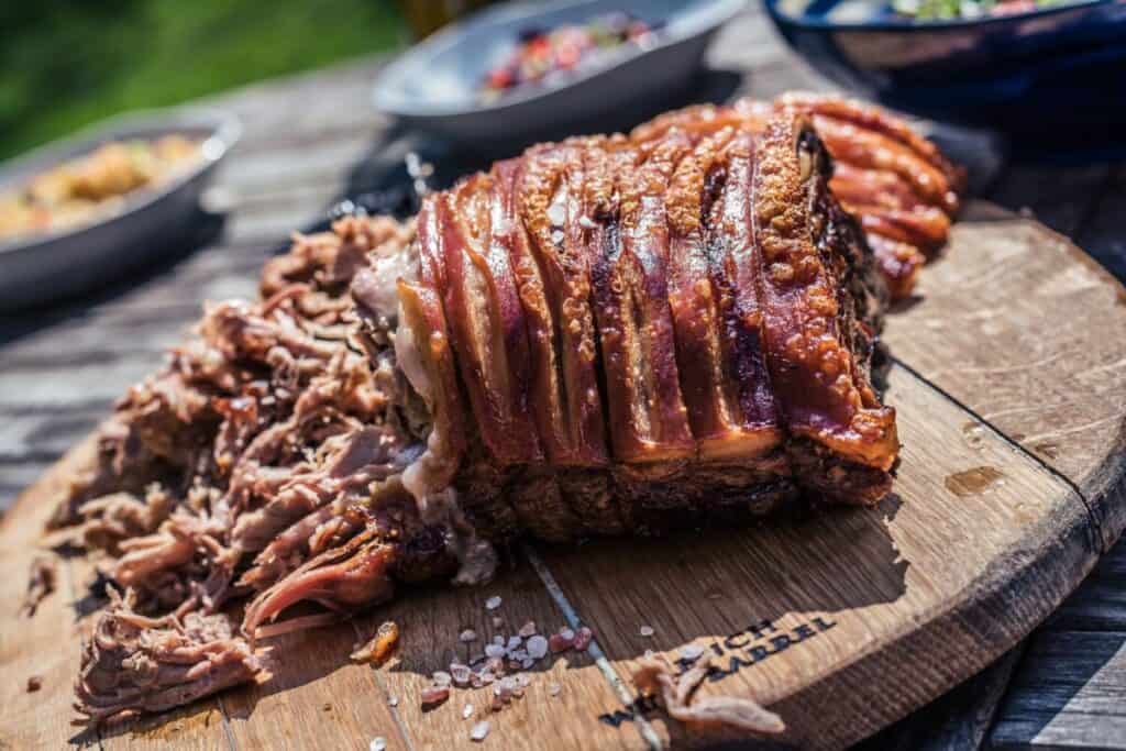 pulled pork on wooden serving platter